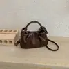 Bolso de mujer diseño de moda nicho 2026 versátil plisado bandolera bolso de mano para ir al trabajo retro nuevo estilo diagonal un solo hombro nube