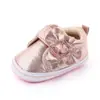 Bebé aprende al por mayor zapatos de lazo brillantes para bebé zapatos de bebé suela suave antideslizantes zapatos para niño pequeño zapatos de bebé 2447