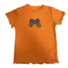 Conjunto de Ropa para Niña 2026 Verano Nuevo Elegante Camiseta de Manga Corta con Lazo para Niños y Pantalones Cortos Florales Conjunto de Dos Piezas