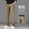 Calça Business Casual Preta de Alta Qualidade Masculina Solta de Perna Reta 2026 Nova Outono/Inverno Resistente a Amassados Emagrecedora para o Trabalho Calça de Terno