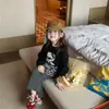 Ropa Infantil Traje para Niñas Sudadera de Dibujos Animados de Manga Larga Más Pantalones de Falda a Rayas y Leggings Conjunto de Tres Piezas 2026 Ropa Nueva Primavera y Otoño