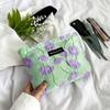 Nicho elegante jacquard nylon bolsa de cosméticos artístico retro elegante flor conveniente clutch bolsa a cuadros transfronteriza
