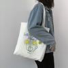 Bolsas 2025 Nova Tendência de Verão Bolsa de Lona Bolsa de Ombro Estilo Japonês Estilo Coreano Fofa Grande Capacidade Bolsa para Estudante Aula Ins