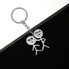 Llavero con colgante de pareja de grafiti de acero inoxidable exclusivo transfronterizo, figura pequeña, llavero de hombre palo grande