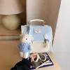 Mochila retro estilo academia de color bloqueado de nicho para mujer 2026 nueva mochila de nicho con textura