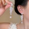 Pendientes Dongdaemun de Corea del Sur, pendientes de alfiler de plata 925, pendientes de perlas retro exagerados europeos y americanos, pendientes largos con borlas para mujer