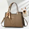 Bolsas de Exportación Taizhou para Mujer 2025 Nueva Moda Hilo Bordado Bolsa para Mamá Bolsa de Mujer de Gran Capacidad Bolso de Hombro Único Cruzado Dropshipping