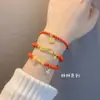 Pulseira de Contas Vermelhas Ano do Tigre Marca Boa Sorte Acessório com Pingente de Franja de Caractere da Fortuna Presente para Mulheres