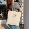 Bolsa de Lona para Mulheres 2025 Nova Estudante Grande Capacidade Bolsa de Mão Estilo Literário Preppy Bolsa Tiracolo Simples Bolsa de Ombro Estampada