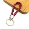 Nuevo Llavero de Cuerda de Cuero Tejido Colgante Creativo para Mochila Llavero Empujar Pequeño Regalo Llavero de Coche Venta al por Mayor
