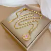 [Acero de titanio] Elegante collar de microdiamantes con flores de lujo y luz, estilo fino para mujer, accesorios de cadena de clavícula de celebridades cibernéticas.