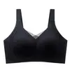 Sujetador sin costuras con copas fijas para mujeres con senos grandes, diseñado para minimizar el tamaño del busto, proporcionar soporte, prevenir el desbordamiento lateral y prevenir la flacidez. Disponible en tallas grandes, este sujetador deportivo ofrece elevación y soporte.