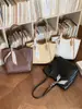 Bolsa de trabalho de verão 2026 transfronteiriça, alta qualidade, simples, grande capacidade, bolsa tote elegante de ombro e de mão