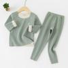 Conjunto de roupa interior térmica infantil por atacado de veludo lixado na superfície AB sem costura para meninas meninos roupas de outono conjunto de calças de outono geração de pelos