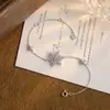 Pulsera Navideña de Copo de Nieve Pulsera de Lujo Ligero Japonesa y Coreana Engastada a Mano con Cristal Puntiagudo Azul Zirconio Blanco Plata Esterlina Elegante Mano Blanco Nicho