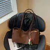 Bolso bandolera de un solo hombro personalizado estilo coreano, bolso de mano casual de color liso, nuevo modelo principios de otoño 2026, bolso de hombro de gran capacidad para el día a día