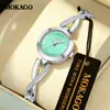 Mokago relógio feminino versátil temperamento mostrador madrepérola pulseira de metal relógio incrustado com strass formato de coração moderno relógio de quartzo atacado