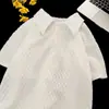 Camisa polo de manga corta para hombre, verano, marca de moda, holgada, con solapa, camiseta, estilo japonés, alta gama, gofrado, estilo ligero y maduro, ropa superior