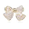 Broche de estilo europeo y americano con diseño de lazo, ideal para decorar bodas y fiestas.