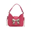 Bolso de Mano Niche con Lazo 2025 Nuevo Estilo Coreano Mini Bolso Cruzado de Cadena Moda Lápiz Labial Audífonos Bolso de Hombro