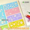 Set Creativo y Versátil de Reglas Calidoscopio Multifuncionales para Informes Dibujados a Mano, Dibujo y Plantillas Geométricas Huecas para Estudiantes de Primaria