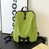 Verde lima vibrante, mochila suave y linda de gato negro, perfecta para niñas y estudiantes, con un estilo dulce y genial, adecuada para ir al trabajo, uso casual y versátil para diversas ocasiones