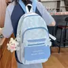 Mochila 2026 Novo Estilo Cores Frescas e Doces Color-Blocking Bolsa para Alunos do Ensino Médio e Universitário Grande Capacidade Versão Coreana para Meninas do Ensino Fundamental