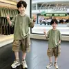 Conjunto de Pantalones Cortos Cargo de Manga Corta Camuflados para Niños Verano 2026 Nuevo Estilo de Verano Atuendo Moderno Fresco para Niños Pequeños y Mayores Dos Piezas