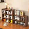 Portavasos de nueve compartimentos, organizador para tazas y tazas de té, estante de almacenamiento multicapa simple, soporte de exhibición para figuras y adornos, estante de exhibición multifuncional