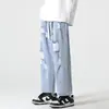 Jeans Cropped Rasgado High Street Tendência para Homens Verão 2026 Calça Estilosa de Cintura com Cordão, Corte Reto, Solta, Moda Única