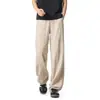 Textura refrescante pantalones rectos color albaricoque claro líneas segmentadas tridimensionales holgados adelgazantes ligeros con caída pantalones hasta el suelo moda masculina