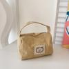 2024 Nuevo Estilo Japonés Moderno Sencillo Bolso Cuadrado Pequeño Bolso de Cosméticos Casual Diseño de Nicho Moderno Distintivo Portátil Bolso para Mujer