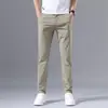 Pantalones Casuales Delgados de Seda Helada para Hombre Verano 2025 Pantalones Rectos Ajustados de Moda Pantalones de Color Sólido Elásticos Versátiles