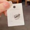 Moda Retro Francesa Estilo Simple Clips Metálicos para Orejas sin Perforación Incrustados con Diamantes con Diseño Único para Mujeres