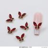 Arte de uñas de celebridades cibernéticas, joyería de mariposa, diamante, súper destello, Año Nuevo, cristal rojo, mariposa, acabado, luz, lujo, todo a juego, accesorios de uñas dorados