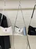 Bolsa de Marca Extranjera de Nicho para Mujer Modelo Nuevo 2026 Super Popular Bolso Cubo Acolchado con Cadena con un Toque de Alta Gama Versátil Bolso de Hombro y Cruzado
