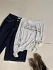 WGWE2026 Otoño Estilo Chica Caliente Americana Estampado de Letras Ajustado Ligeramente Transparente Hombros Descubiertos Manga Larga Camiseta W10842
