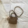 Bolso de Mujer Elegante de Alta Apariencia de Shuai Mi, Nuevo Bolso Cruzado de Cubo Estilo Coreano Simple, Bolso de Hombro para Viaje de Primavera 2026