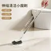 Escova de limpeza extensível para uso doméstico, projetada para limpar frestas de janelas e pisos, com corpo estreito e cabo longo, ideal para banheiros e outras áreas com espaços apertados.