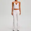 Nuevo traje deportivo casual estilo europeo y americano para mujer, sujetador deportivo de tiras halter ajustables, conjunto de yoga con microcampana que levanta los glúteos