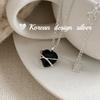 Collar con colgante de cruz de ónix negro de amor de plata esterlina S925 de Corea del Sur Dongdaemun 2024 para mujer