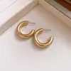 Brincos de Metal Prateado em Forma de C Estilo Minimalista Europeu e Americano Moda Simples Brincos de Tarraxa High-End Brincos Únicos de Nicho Venda por Atacado