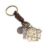 Chaveiro de couro de vaca vintage novo, direto da fábrica, pingente de liga de bronze, bolsa pendurada