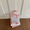 Moda transfronteiriça grande capacidade 2026 novo estilo bolsa balde bolsa de mão feminina versátil bolsa de mão de nicho pequeno bolsa de ombro bolsa transversal