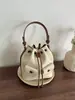 Bolso cubo liso de color para mujer, importado, nuevo modelo 2026, bolso de mano con cordón, elegante, moderno, de un solo hombro, cruzado