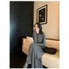 Vestido largo de punto negro de alta gama estilo francés para mujer, modelo nuevo de principios de otoño 2025, entallado a la cintura, vestido largo con capas interiores
