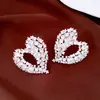 Brincos de Coração Vazado com Zircônia Cúbica Agulha de Prata Luxo Leve High-End Francês Elegante Brincos Temperamento Moda Versátil Acessórios de Brincos Mulheres