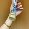 Regalos del Festival del Medio Otoño para Clientes: Pasteles de Luna, Bolsas de la Suerte, Dijes Dorados para Teléfono, Llaveros, Cadenas para Teléfono, Dijes para Bolsos