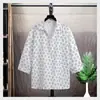 Camisa de Manga Três Quartos para Adolescentes Masculina Verão 2025 Nova Camisa Estampada de Manga Meia-Manga Solta Respirável Tendência Marca Top Masculino