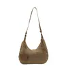 Bolsa de palha tecida nicho estilo coreano para mulheres, nova tendência primavera 2026, bolsa versátil vazada para praia e ombro/transversal
